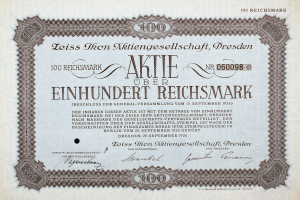 Schwarzumrandetes deutsches Wertpapier für 100 Reichsmark mit der Aufschrift "Aktie über Einhundert Reichmark".